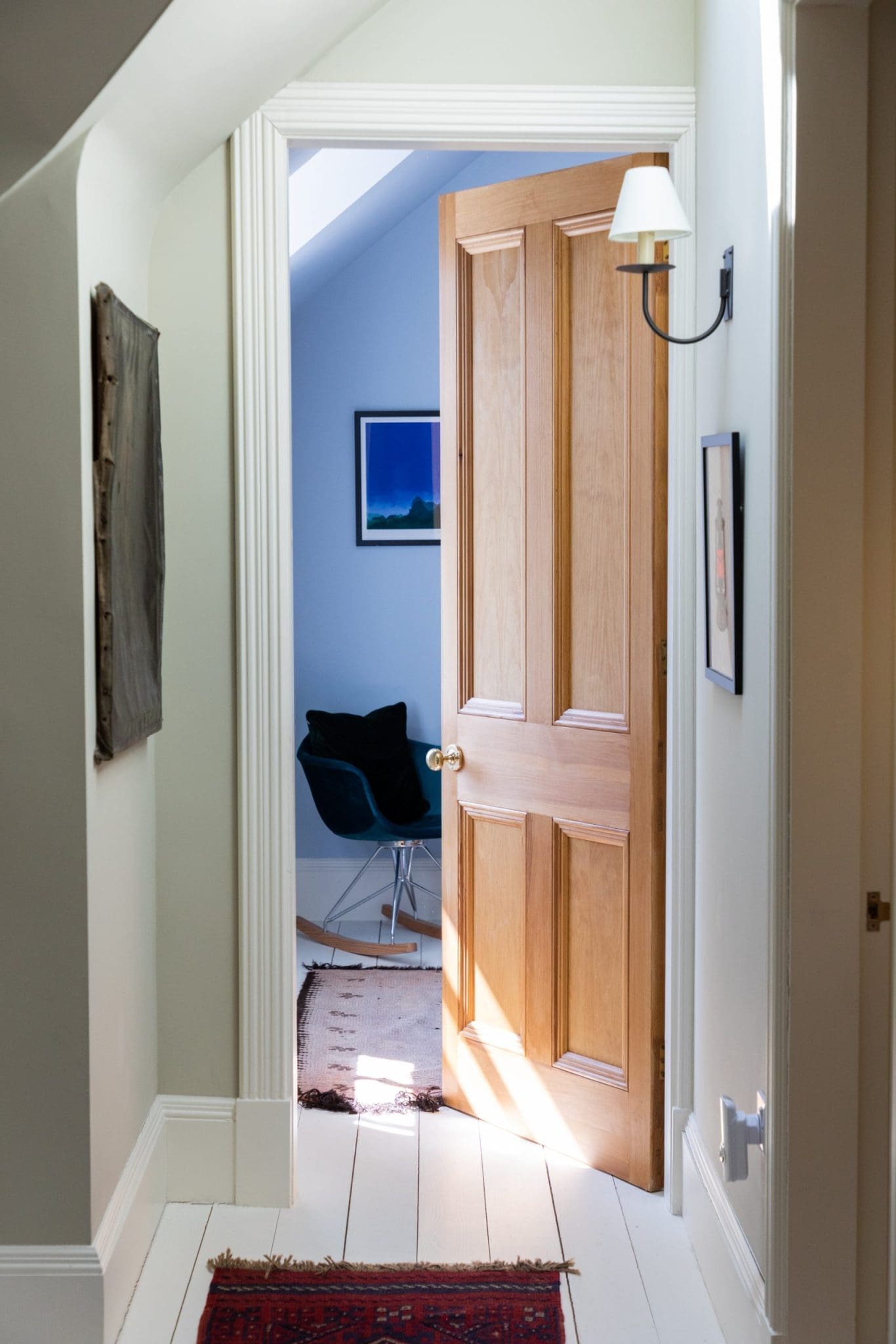 Photo taken of the interior of the North Lodge Cabin. Showcasing its bright colours, and cosy furnishings.
