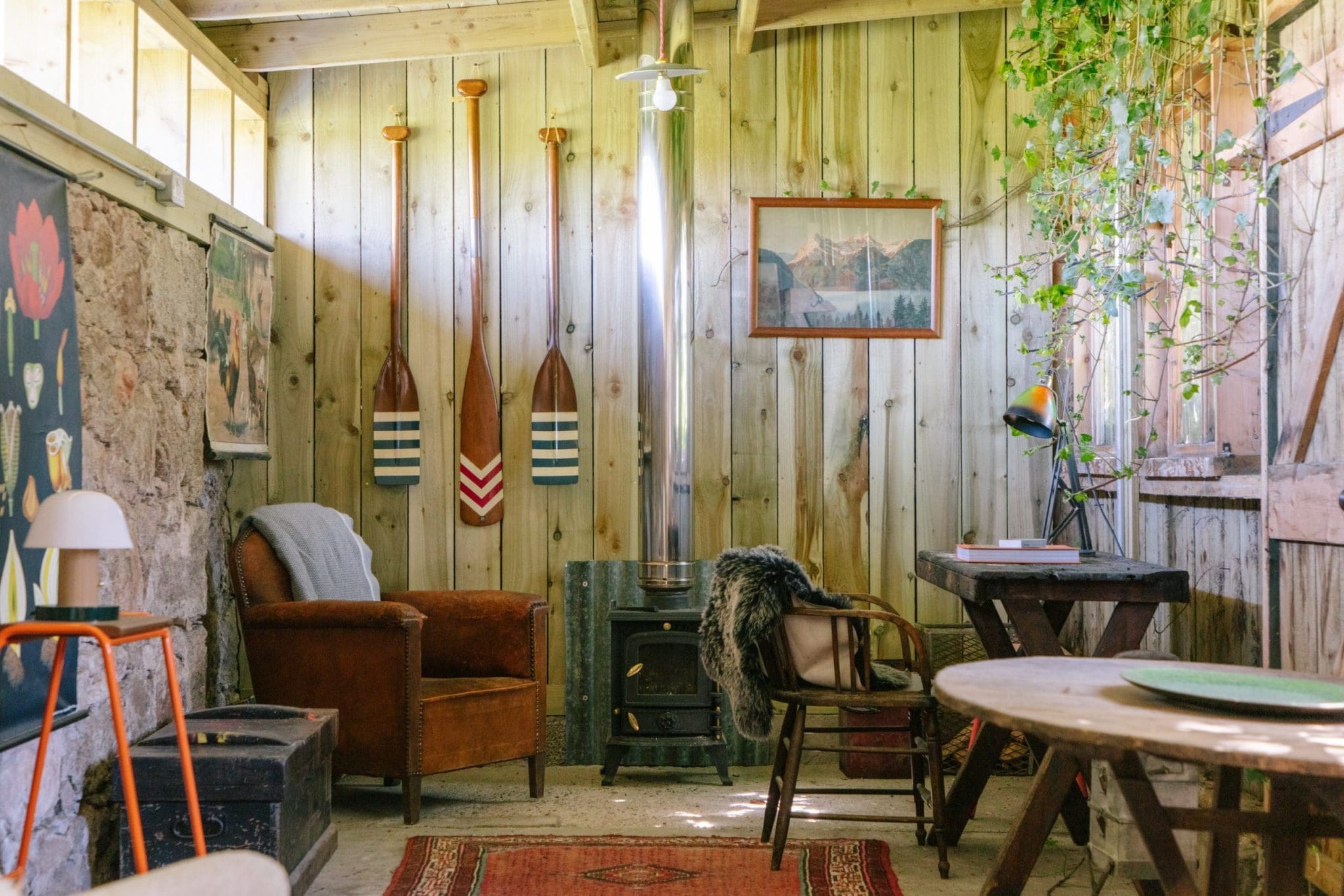 A snap of the cosy and warm furnishing of the Cuttieshillock Cottage with its wooden walls and natural flooring.